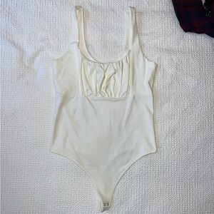 White bodysuit with pinch top